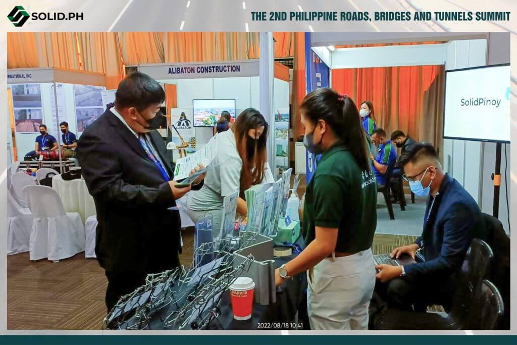 Attendees at the 2nd Philippine Roads, Bridges and Tunnels Summit, viewing exhibits.