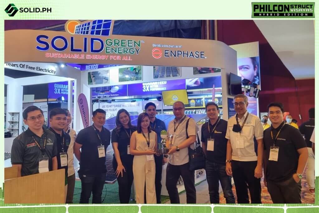 Group photo at the Solid Green Energy booth at PhilConstruct Visayas, featuring Enphase solar solutions.