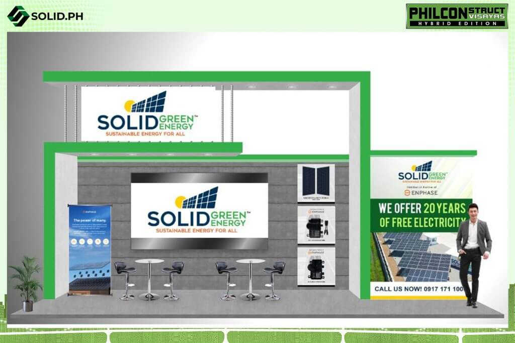 Trade show booth for Solid Green Energy, featuring solar panels and "20 Years of Free Electricity" promotion.